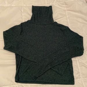 Green turtleneck sweater